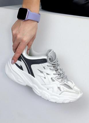 Натуральні шкіряні білі кросівки з текстильними вставками2 фото