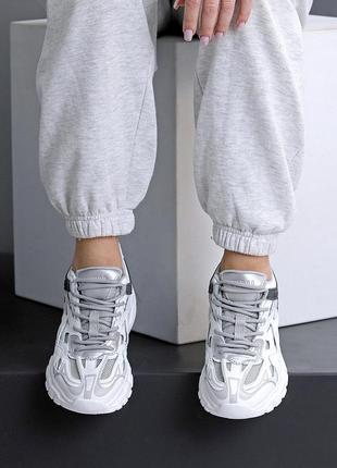 Натуральні шкіряні білі кросівки з текстильними вставками8 фото