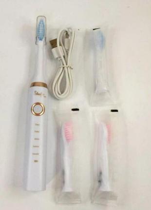 Электрическая аккумуляторная зубная щетка с насадками2 фото