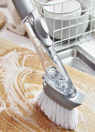 Щетка для мытья посуды с ручкой и дозатором моющего средства + 1 насадка губка1 фото