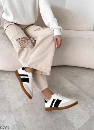 Венгрия белые кеды - кроссовки с серыми и черными вставками7 фото