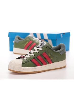 Стильные женские кроссовки tmnt x adidas superstar shelltoe зелёные1 фото