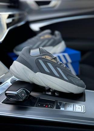 Мужские кроссовки серые adidas originals ozelia gray gold4 фото