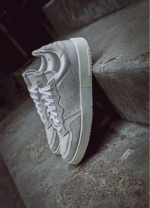 Кросівки білі adidas original supercourt2 фото