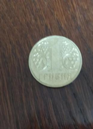 Монета номіналом в 1 грн 2001року1 фото