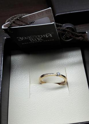 Продам золотое  кольцо с бриллиантом1 фото
