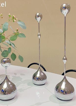 Набор изысканных металлических подсвечников