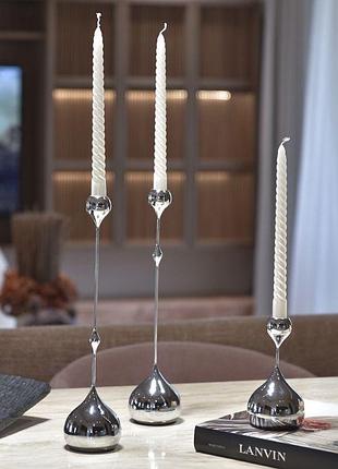 Набор изысканных металлических подсвечников