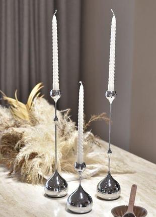 Набор изысканных металлических подсвечников
