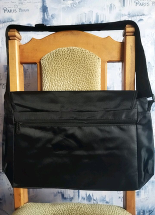 Продам по оптовій ціні
чоловічі чорні сумки
від бренду ( puma )2 фото