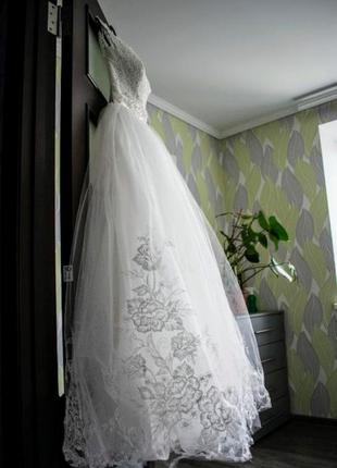 Ніжна весільна сукня кольору айворі з вишивкою8 фото