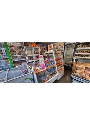Продам торговое оборудование (стеллажи и холодильники).