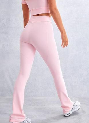 Стильные спортивные штаны лосины розового цвета4 фото