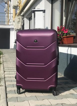 Уценка! чемодан на колесах из поликарбоната большой фиолетовый