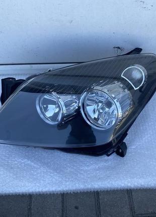 Фара передня ліва opel astra h 2004-2014, темна, оригінал, б.