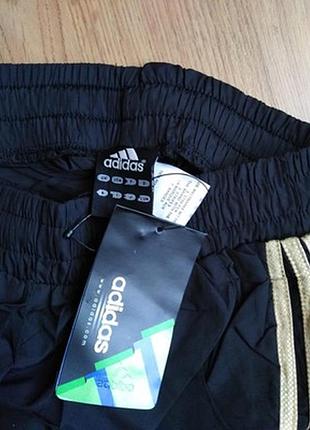 Спортивные штаны с золотыми лампасами adidas s m xl низкая посадка10 фото