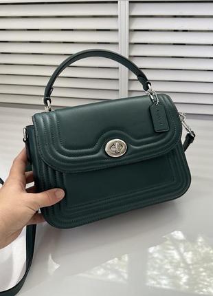 Зеленая кожаная сумка marlie top handle green coach1 фото