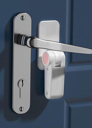 Блокувальник дверних та віконних ручок замок від дітей door lever lock white2 фото