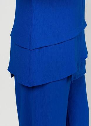 Яркий женский летний костюм из туники и брюк, большие размеры8 фото