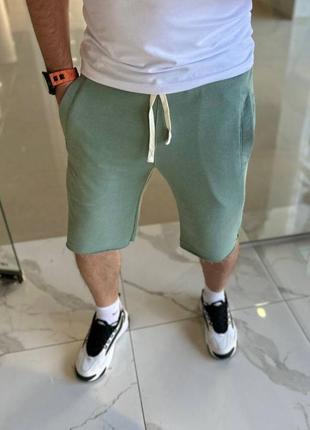 Мужские удлиненные шорты с резинкой и шнурком в поясе с карманами2 фото