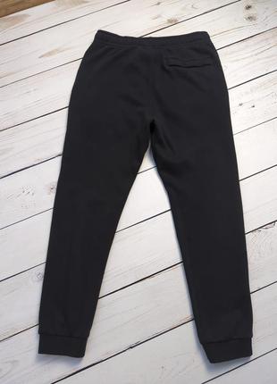 Чоловічі чорні завужені спортивні штани nike / найк на флісі утеплені оригінал7 фото