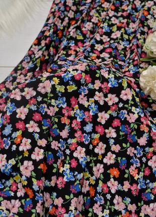 Красива плісерована юбка міді в квіти new look.4 фото