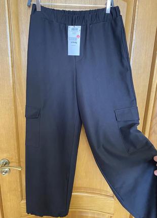 Новые чёрные очень модные стильные широкие брюки карго снизу на кулисках 46-50 р2 фото