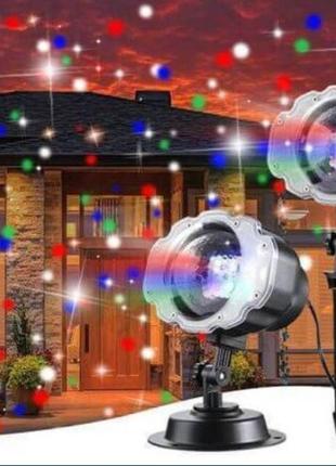 Лазерний проектор вуличний новорічний лазер на будинок 8092 фото