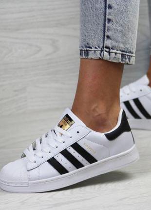 Жіночі кросівки білі з чорним superstar4 фото