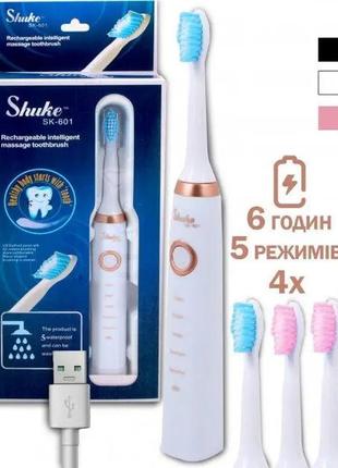 Вібруюча електрична зубна щітка shuke з 4 насадками usb біла1 фото