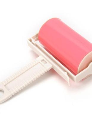 Многоразовый ролик-липучка для чистки одежды рожевий2 фото
