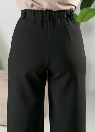 Черные молодежные брюки палаццо в деловом стиле больших размеров 42-5410 фото