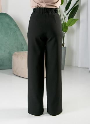 Черные молодежные брюки палаццо в деловом стиле больших размеров 42-543 фото