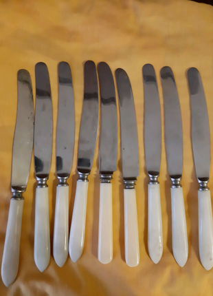 9 нових ножів з нержавіючої сталі.