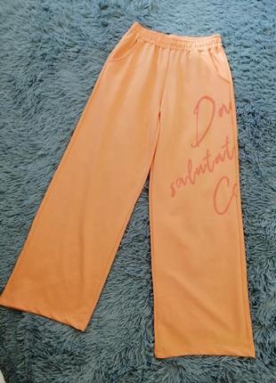 Летний морковные брюки кюлоты трикотаж туречковая накатка надпись1 фото