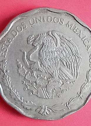 Монета мексики 50 сентаво.