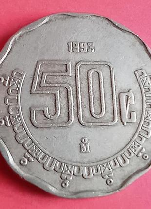 Монета мексики 50 сентаво.2 фото