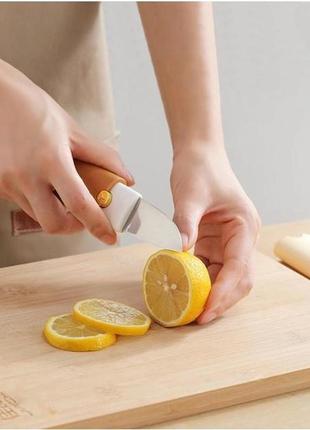 Кухонный многофункциональный нож овощерезка 2 в 1 knife and192 для  овощей и фруктов3 фото