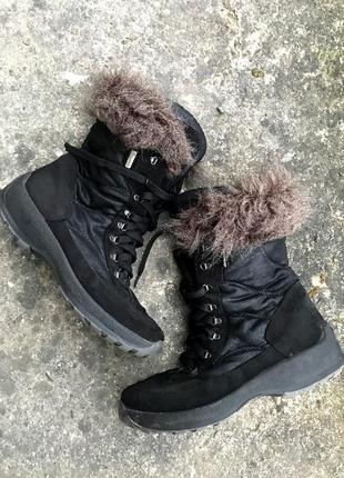 Високі зимові черевики - взуття з хутром7 фото