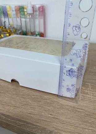 Самозбірні білі подарункові коробки з вікном2 фото