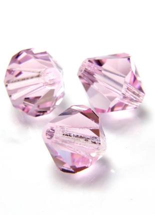 Бусины биконусы хрустальные preciosa pink saphire 12мм, упаковка 5шт. скидка!1 фото