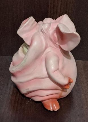 Оригінальний подарунок - розова керамічна свиня копилка.