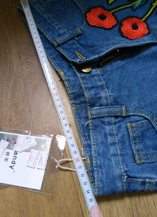 Нові джинсові патріотичні шорти з вишивкою, 44 розміру (s).4 фото