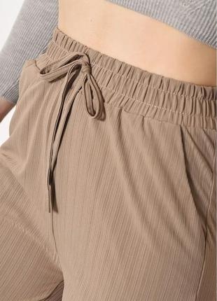 Стильные широкие женские штаны в рубчик фактурные женские штаны широкого кроя штаны-палаццо4 фото