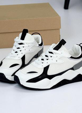 Комбинированные фактурные белые кроссовки с черными вставками9 фото