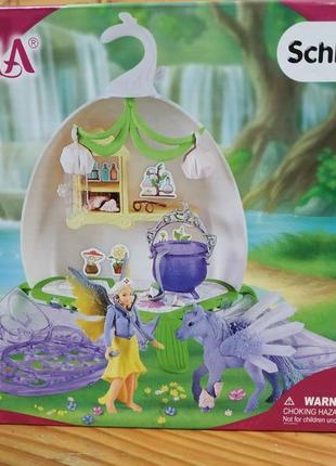 Schleich 42523 bayala квітка з ветеринарною клінікою і пегасом