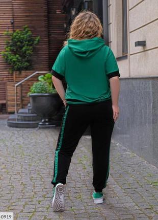 Молодіжний жіночий костюм для прогулянок із двонитки футболка з капюшоном та штани з лампасами батал арт 8224 фото