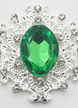 Камень в серебристой ажурной оправе  24*26 мм зеленый