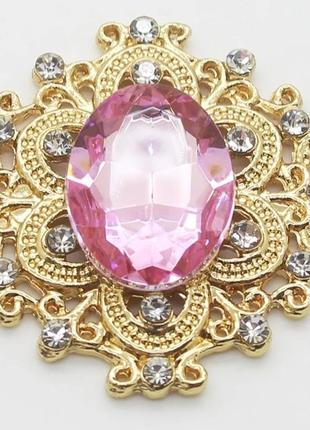 Камінь в золотистій ажурній оправі 24*26 мм світло-рожевй