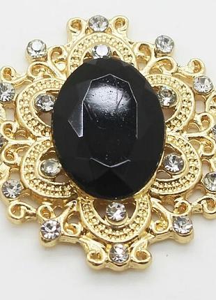 Камінь у золотистій ажурній оправі 30*32 мм чорний